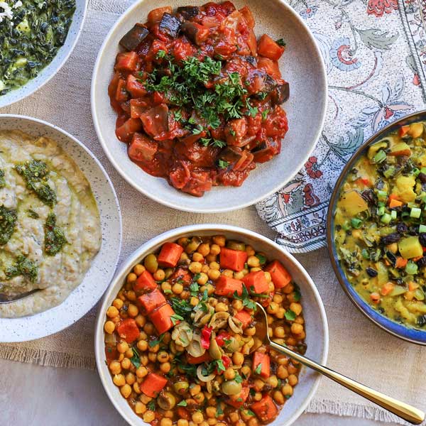 MBI Foods Mediterranean Side Dishes in a family-style dining spread